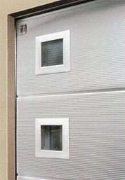 Picture showing type E square windows on Carteck sectional garage door